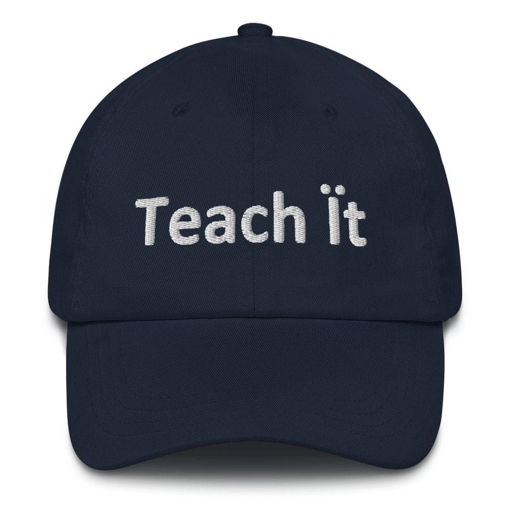 Navy cap with "Teach it" text.