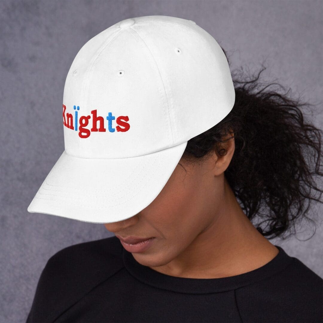 White cap side view with red-blue Knights embroidery
