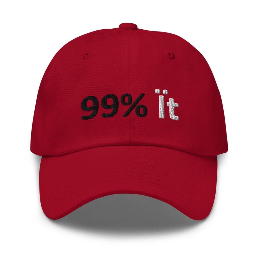 Red baseball cap embroidered "99% it"