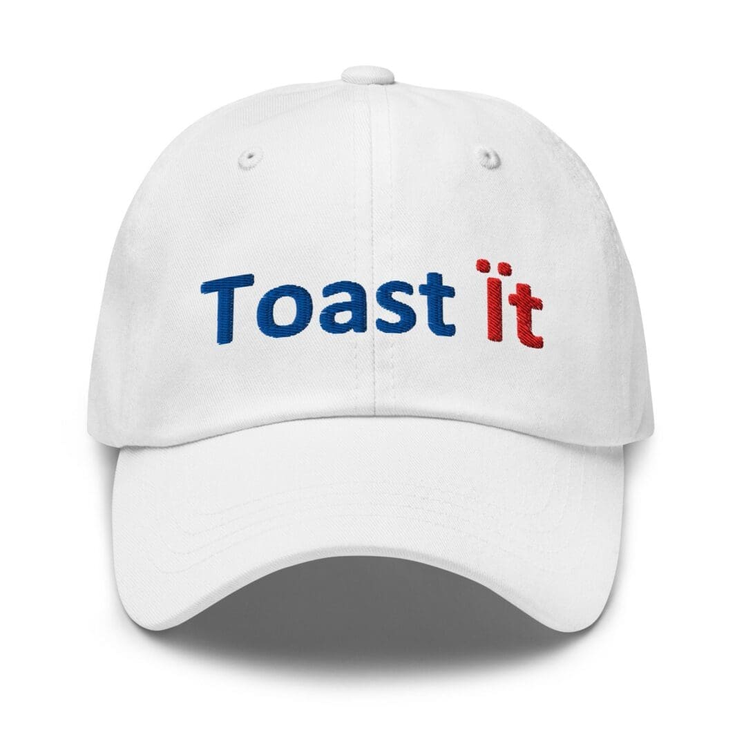 White baseball cap embroidered "Toast it"
