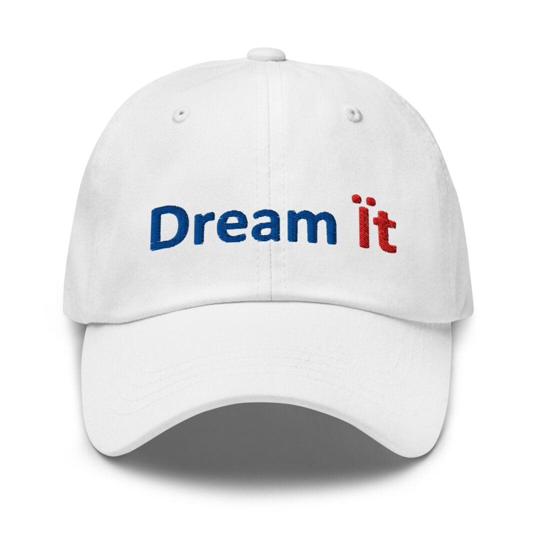 White cap embroidered with "Dream it"
